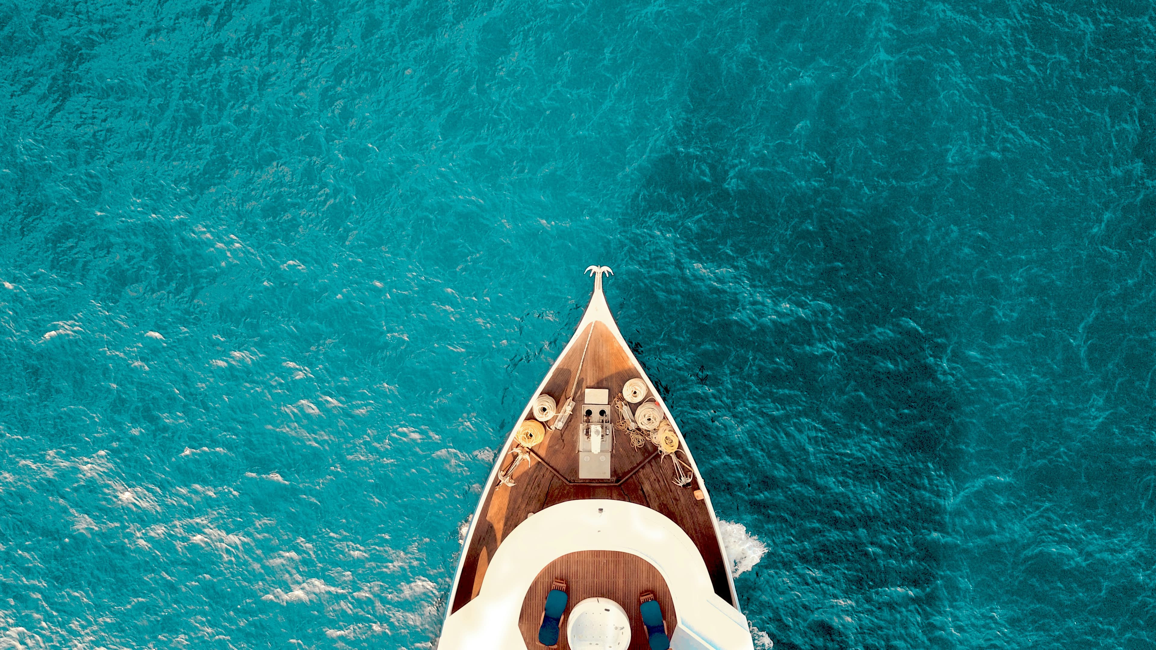 White luxury yacht side profile on calm sea